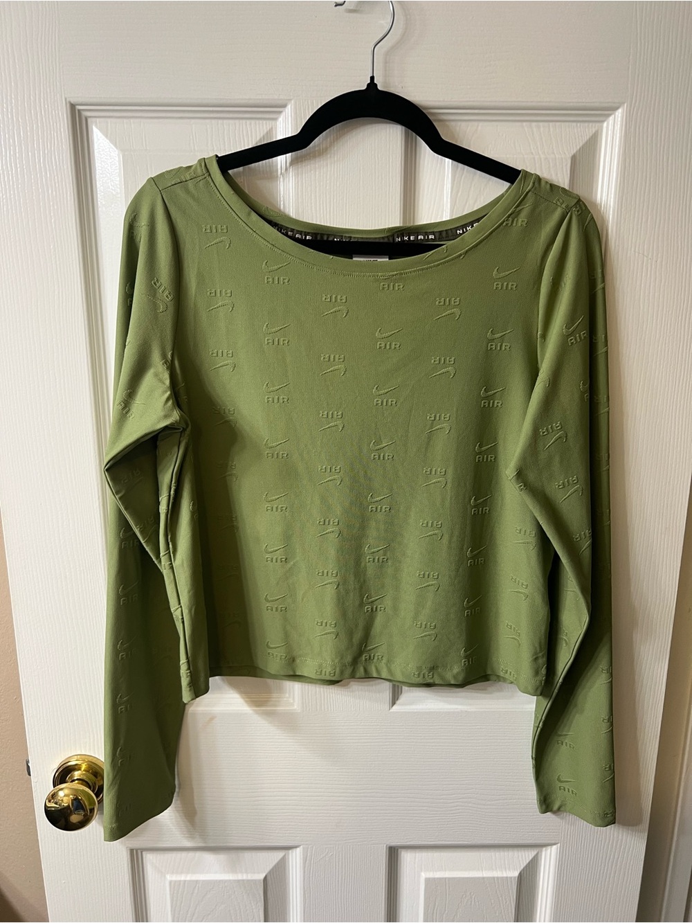 Nike Olive Green Long Sleeve Women's Top with Subtle Embossed Swoosh